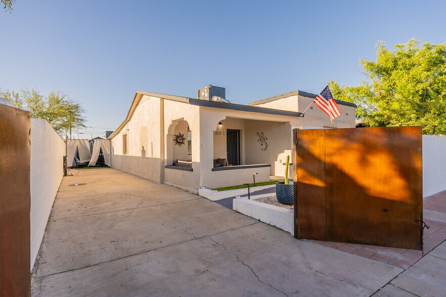 Front gated parking - 227 E 24th St