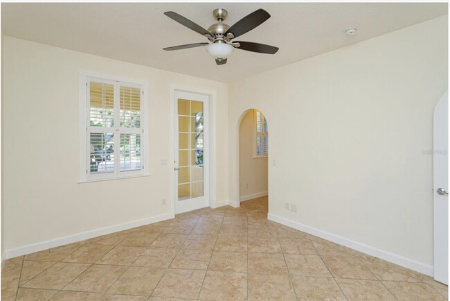 First floor bedroom with den and plantation shutters - 8438 Gilford Ln