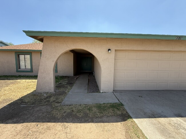 Building Photo - "Charming 4-Bedroom Haven with 2 Baths in ...