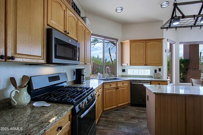 Building Photo - 6879 E Amber Sun Dr