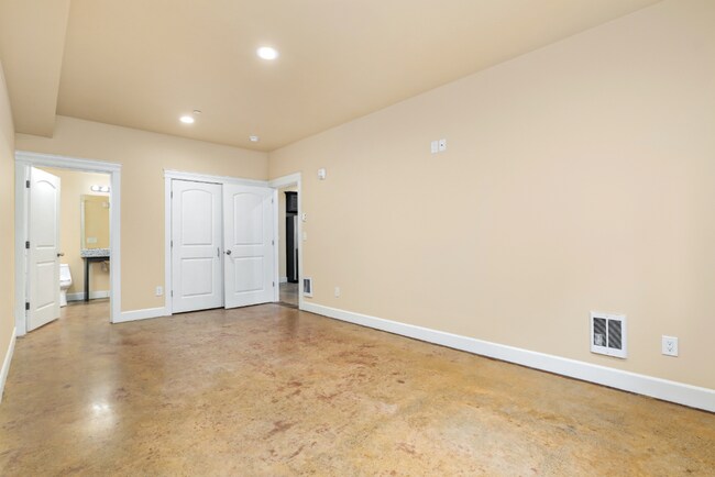 Building Photo - Refined Studio Living at Marigold Apartments — Available Now