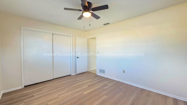 Building Photo - SPACIOUS SARASOTA HOME WITH LARGE FENCED YARD! MOVE IN READY! ALL TILE/ NEW LVP!