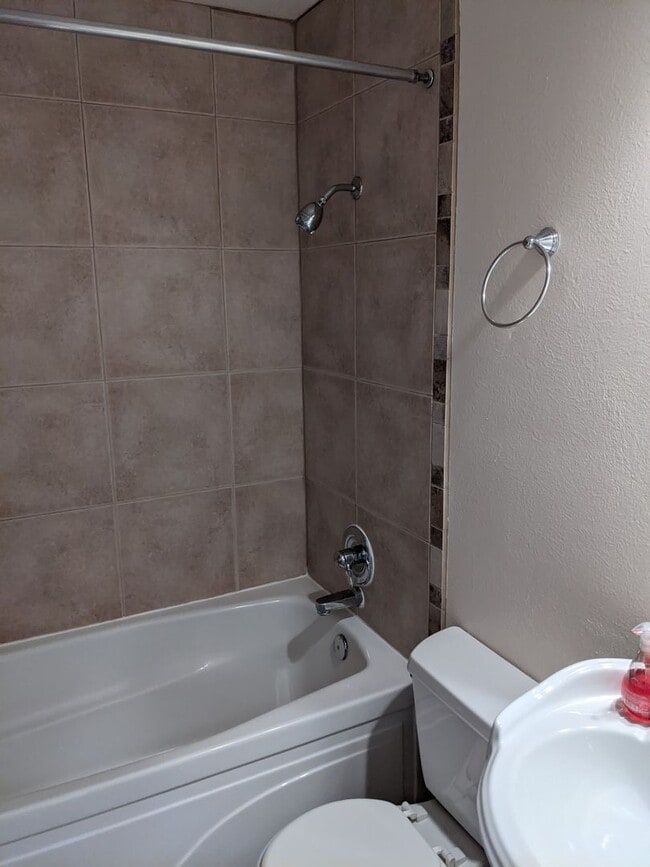 Building Photo - Stunning Golden Townhouse On Top of The World!