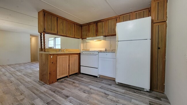 Building Photo - 2 Bed | 1 1/2 Bath | Fenced & Gated 1/4 Acre of land