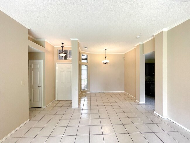 Building Photo - Live near the schools, shops, and dining y...