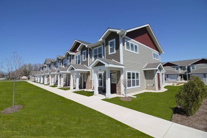 Building Photo - Whispering Echoes Townhomes