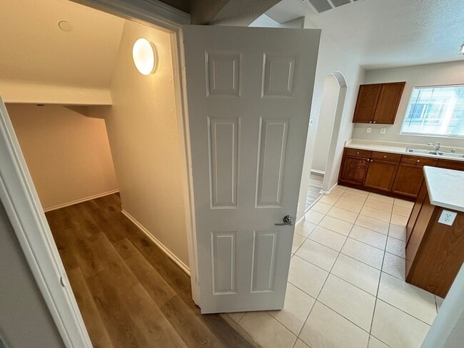 Building Photo - Spacious Tri-Level 4-Bedroom Home with Bal...