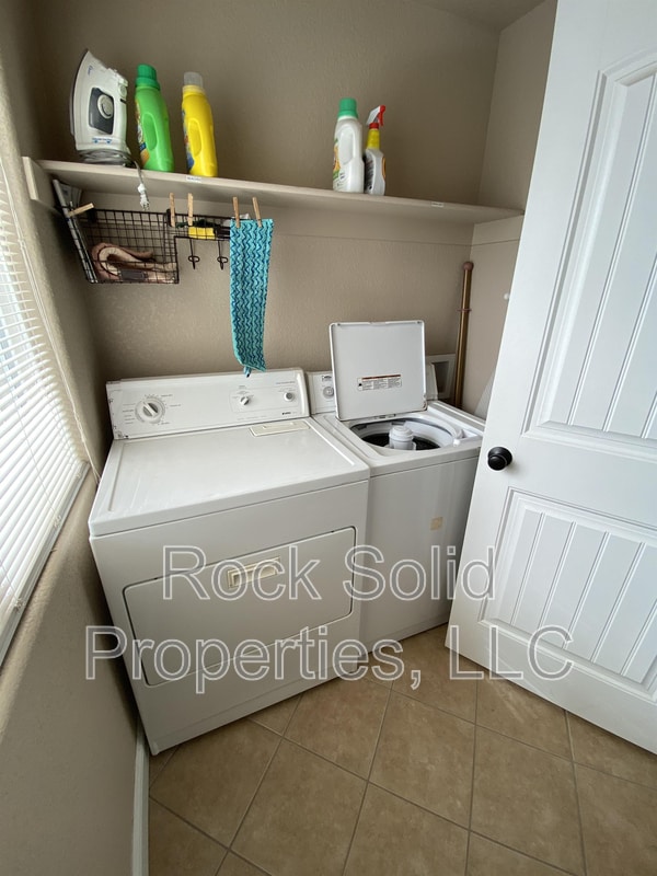 Building Photo - 6971 Boot Strap Ct