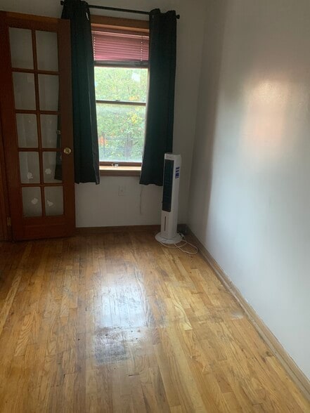 Empty room to right room facing front of house - 75 Saint James Pl