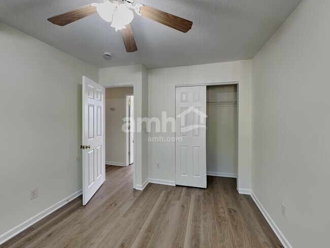 Building Photo - 5202 Carriage Woods Dr