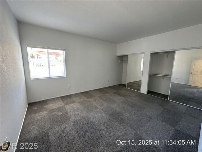 Building Photo - SPACIOUS FIRST-FLOOR CONDO LOCATED IN A GA...