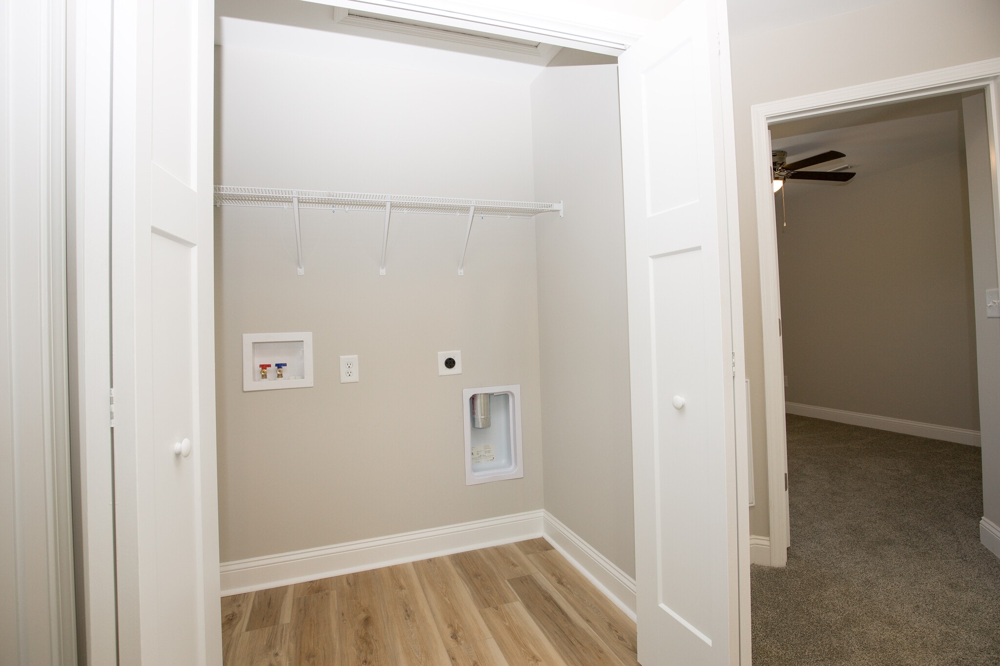 Laundry conveniently located between the primary bedroom & BR #2 & #3 - 470 S Glover St