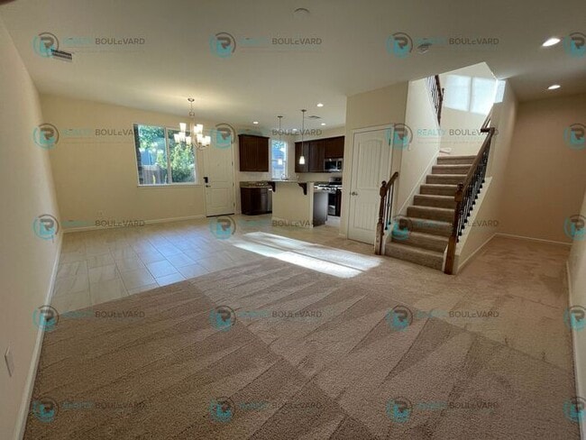 Building Photo - Luxury and Convenience Fully Equipped 3-Bedroom 2.5 Bathroom 2 Car Garage Townhome in Carson City
