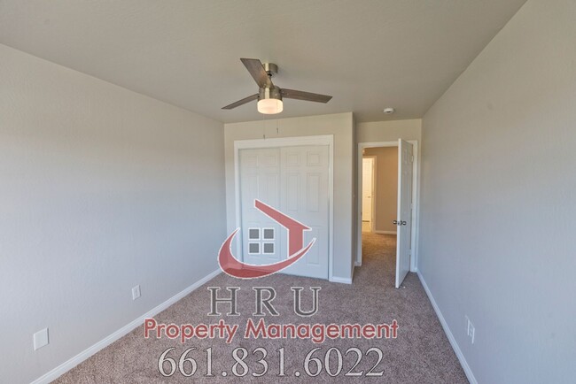 Building Photo - SW-Bakersfield  features 4 bed 2 bath with...