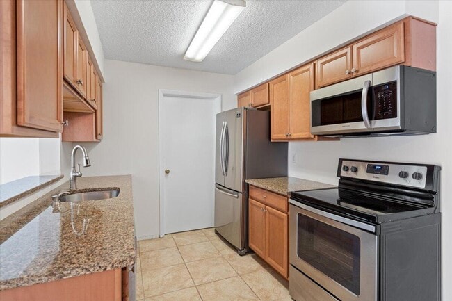 Building Photo - 3902 NW Cinnamon Tree Cir