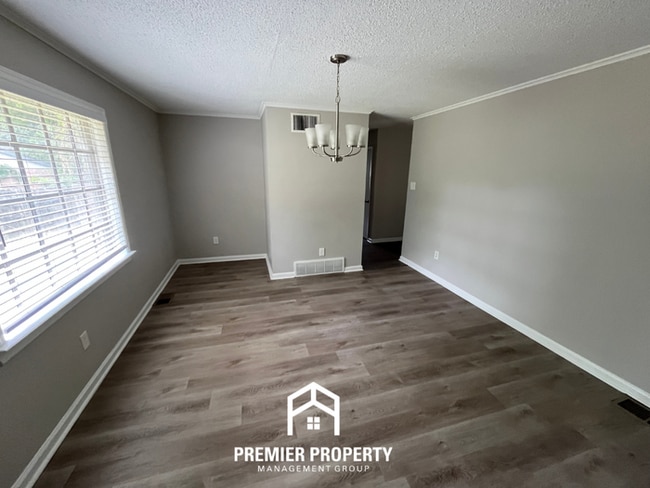 Building Photo - Spacious 4BR/2BA Home in 38118 | Hardwood Floors & Large Fenced Backyard