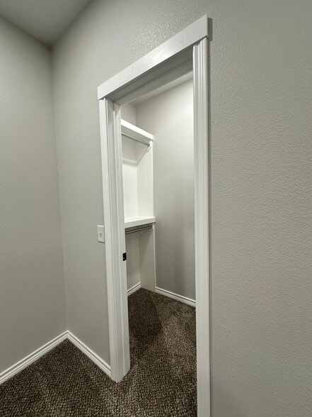 BEDROOM 1 & 2 - WALK-IN CLOSETS - 107 S Bois D Arc St