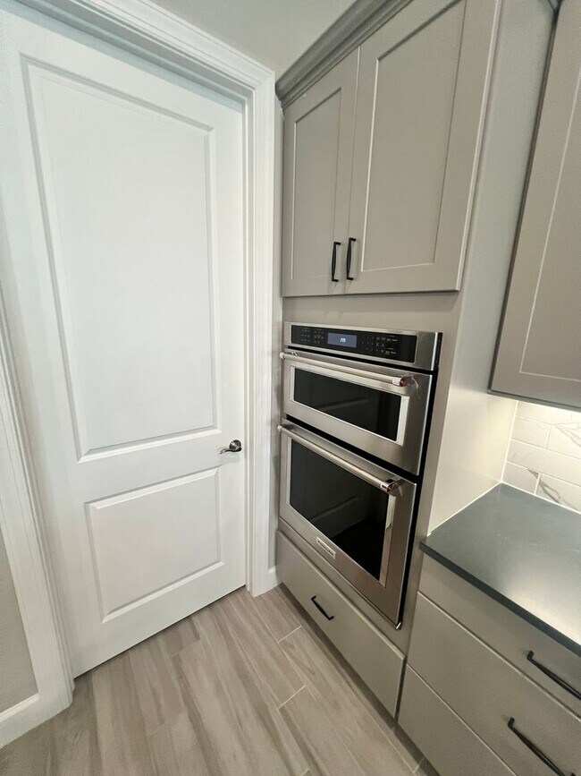Building Photo - STUNNING LAKEFRONT 3 BEDROOM, 2.5 BATH HOM...