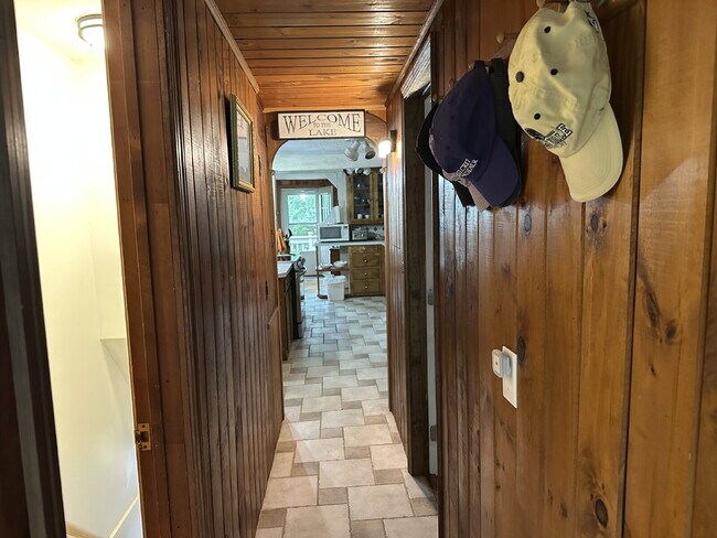 Building Photo - Peaceful Waterfront Living: 2-Story Home on River Road with Ample Outdoor Storage & Water Extras!