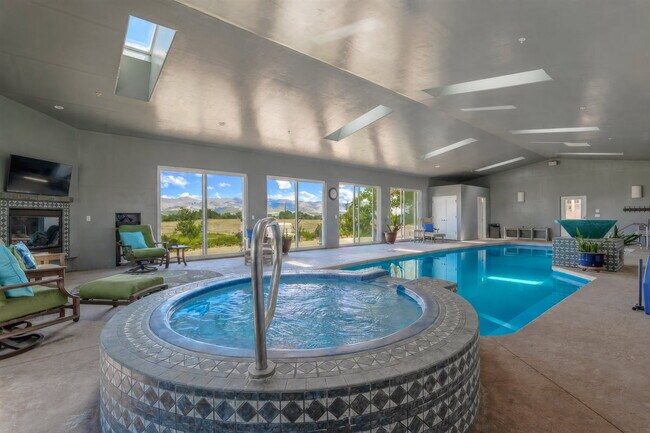 Building Photo - Private Gated Mini-Ranch • 7+ Acres • Luxury Country Living • Indoor Pool • Horses Welcome