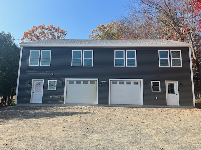 Attached, heated 1-car garage - 135 Surry Rd