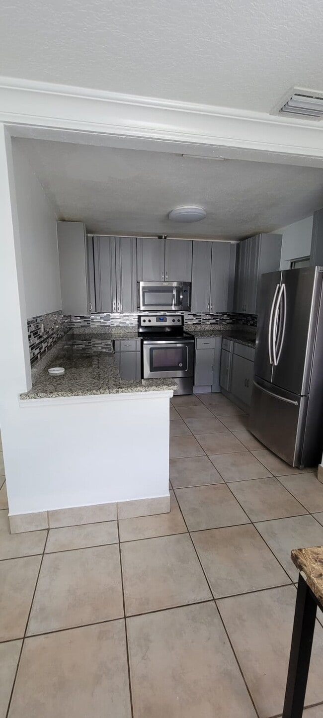 Building Photo - 7018 N Grady Ave