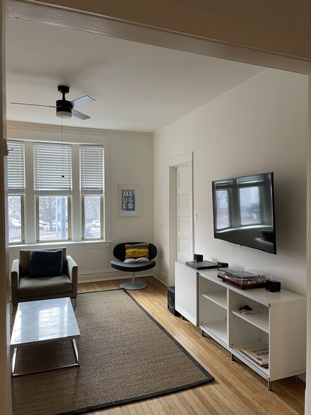 Apartment comes with a tv, stereo, and console cabinet. - 3489 N Elston Ave