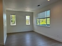 Building Photo - The Vineyards at Dennis Lane Studio unit with back yard and garage