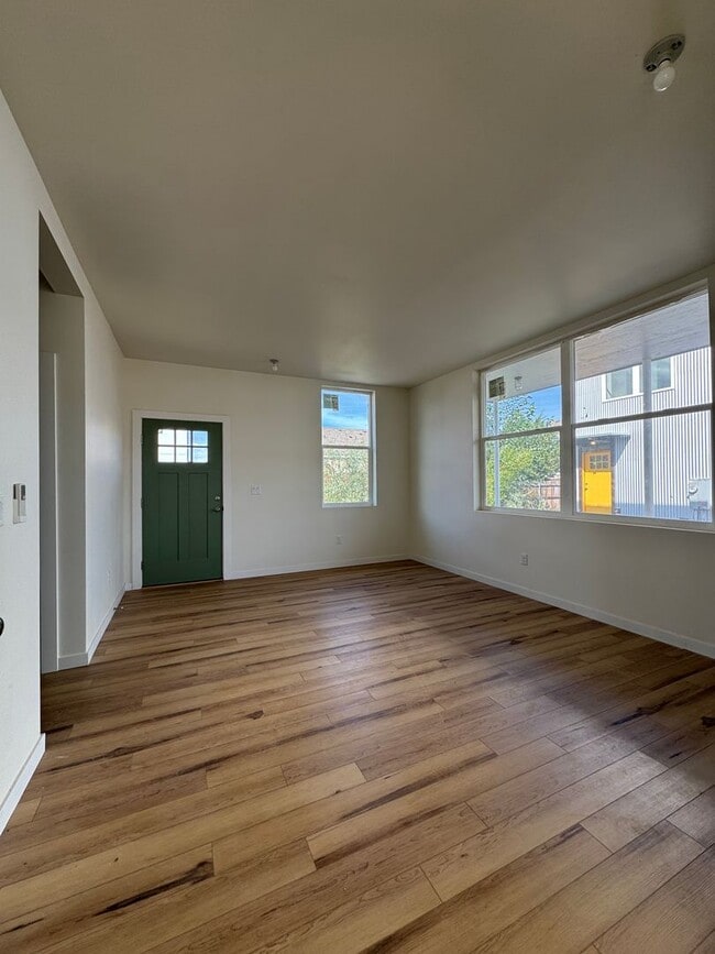 Building Photo - Bright 3BR/3BA with Soaring Ceilings & Lar...
