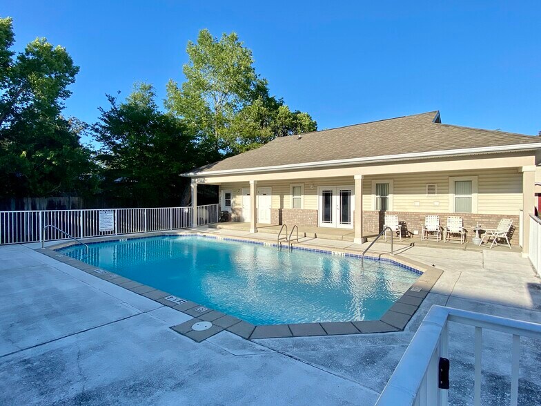 Community pool with clubhouse and laundry facility adjacent. - 1819 Shay-Lin Court