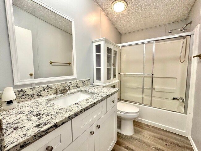Building Photo - Privacy and Space in this 3/2 Home at the ...