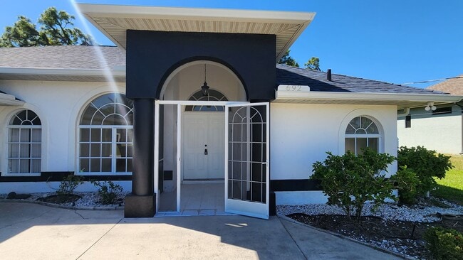 Building Photo - Fresh Paint, New Floors, and a Heated Pool - Move-In Ready!