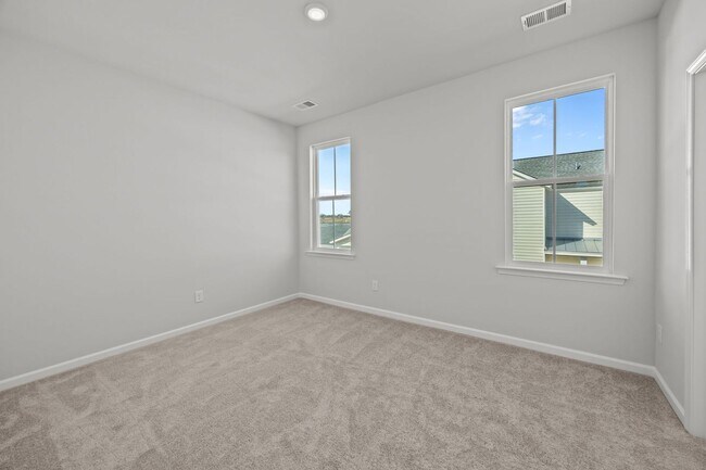 Building Photo - This brand-new home makes a statement from the moment you arrive!