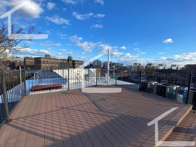 Building Photo - Private Roof Deck, Central Heat/AC, In-Unit Washer and Dryer, Pets Friendly Unit, Luxury Finishes