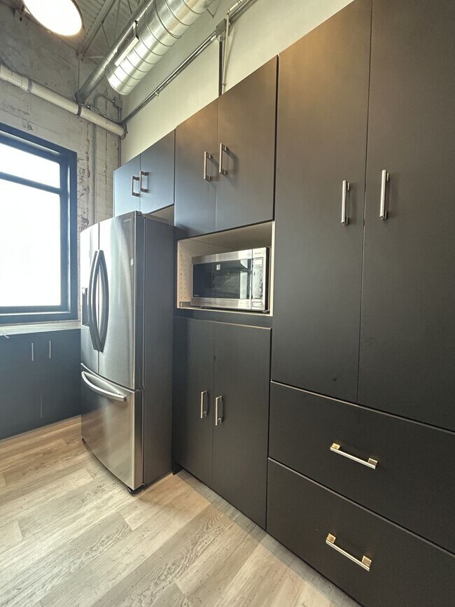 Building Photo - Industrial Style. Downtown Energy. Elevated Living.