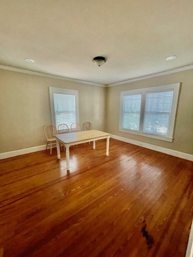 Building Photo - Introducing WesleyHeights401, a charming 3...