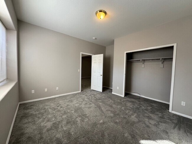 Building Photo - Charming 3BD Townhome in Gated Community just minutes from Peterson AFB & Fort Carson - Security ...