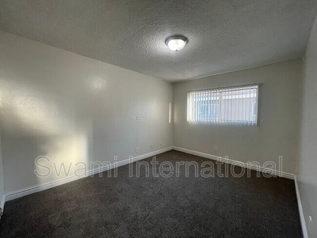 Building Photo - 10970 S Figueroa St