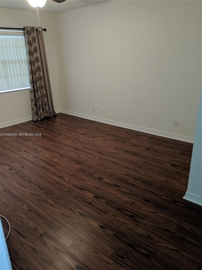 Building Photo - 4030 W Palm Aire Dr