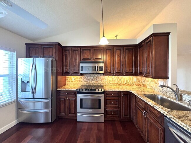 Building Photo - 4818 Breezy Palms Ct