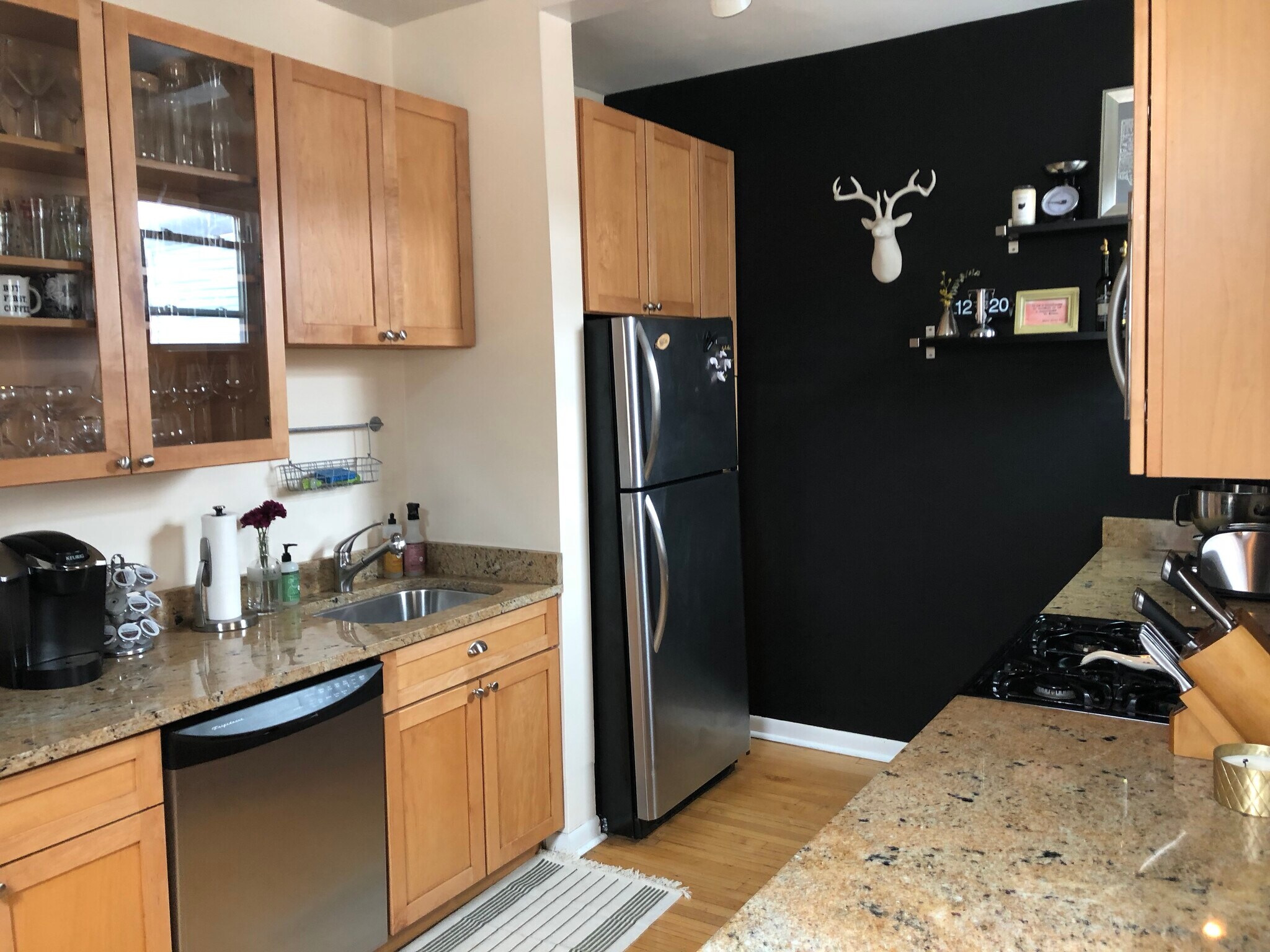 Kitchen with dishwasher, 42 inch maple cabinets, stainless steel appliances, and granite countertops - 3654 N Janssen Ave