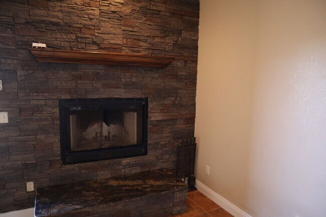 Building Photo - Home With A Pool and Much More!