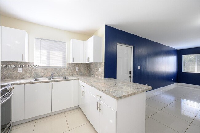 Building Photo - 4477 NW 23rd Ave