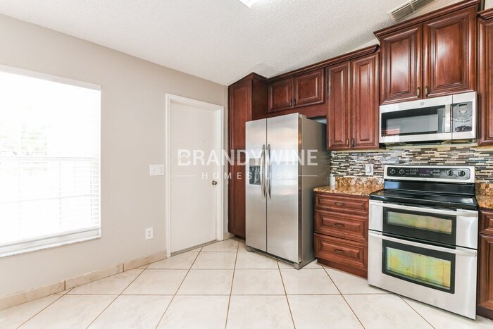 Building Photo - 7803 Myrtle Oak Ln