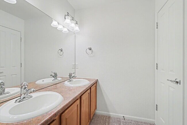 Building Photo - Beautifully Updated 3-Bedroom End-Unit Townhome Facing Open Space with Attached 2-Car Garage in G...