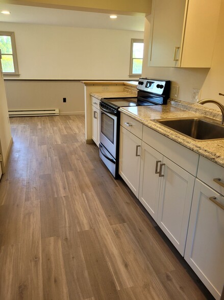 Kitchen from main entry - 21 Drake Rd