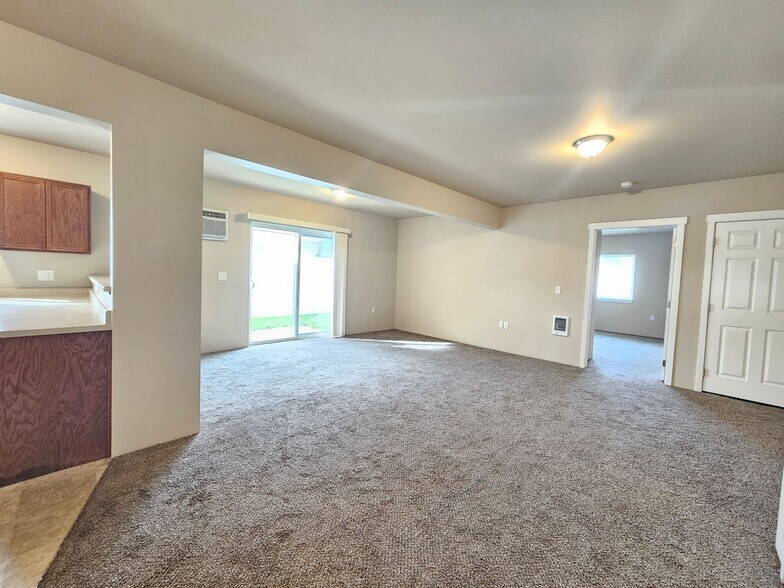 Building Photo - 5205 -5207  E. Upriver Dr.