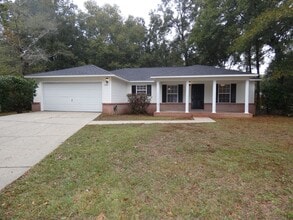 Building Photo - Spacious 3-Bedroom Home — Large Backyard