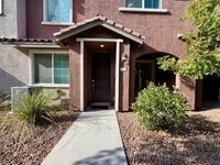 Building Photo - GATED 3 BED 2.5 BATH TOWNHOME WITH 2-CAR GARAGE, COVERED PATIO & COMMUNITY POOL
