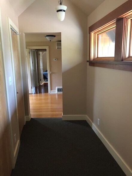 wide hallway with walk-in closet and laundry - 2901 S Lake Ave